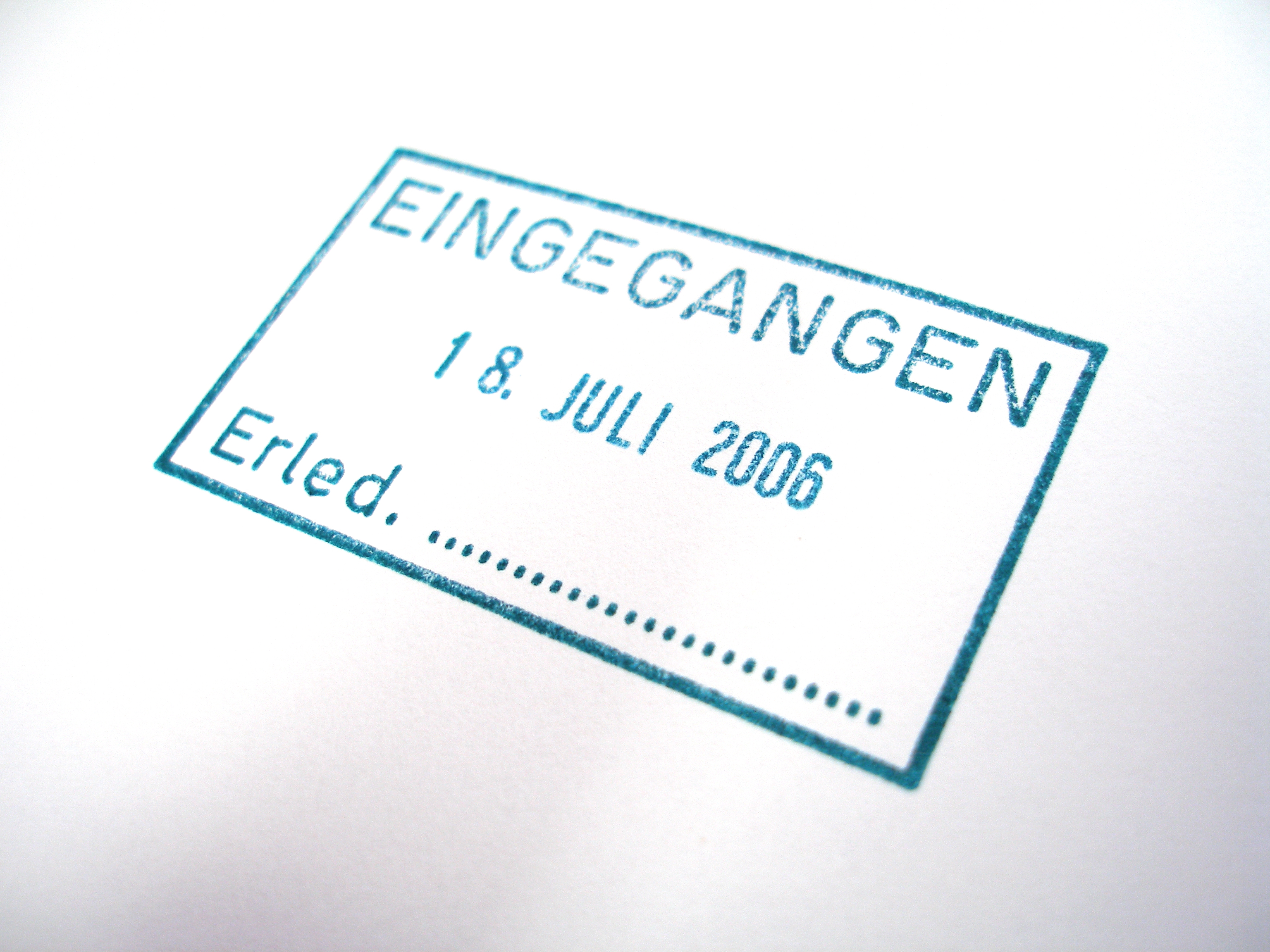 Abdruck eines Stempels mit Aufschrift "Eingegangen"